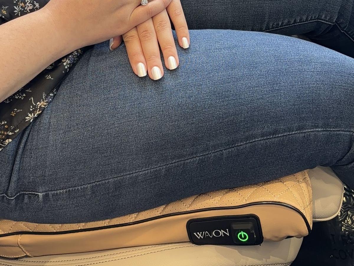 Vanilla Beige: a woman sitting on a Wavon in a car [In use]